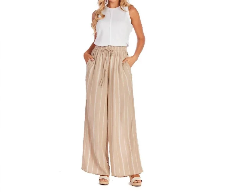 Emily Smocked Trousers In Tan